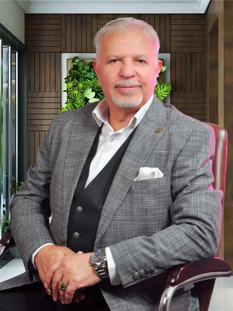 Portrait of Dr. Eng. Azmi Al-Eesa, Chairman and Founder of SKRC, in a professional setting.